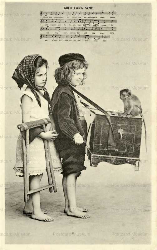 ag710-Boy Organ Grinder with Girl & Monkey