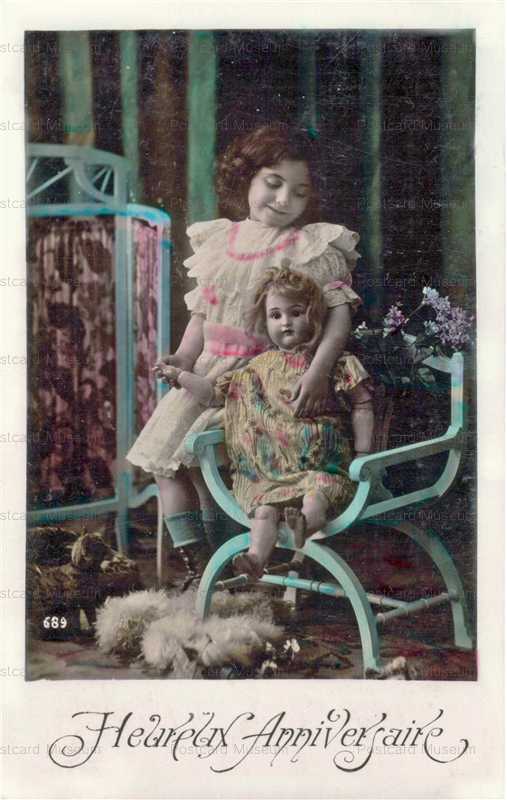 do014-Girl with Doll in Chair