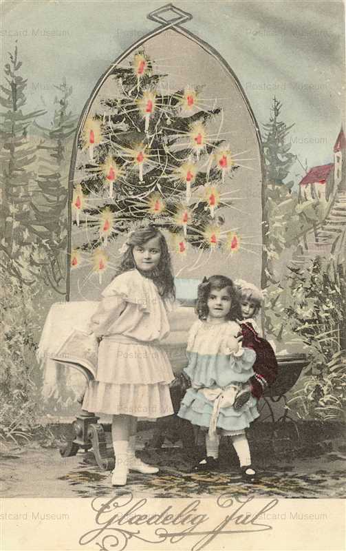 do175-Victorian Girls&Large Porcelin Doll Next to Christmas Tree
