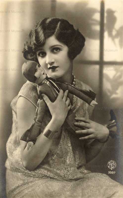 dob220-Lady Holding Doll