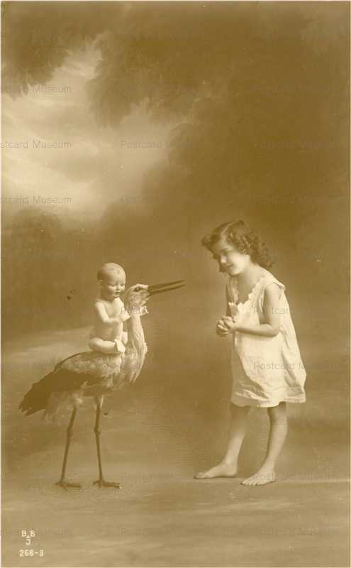 dob270-Girl with Doll and Stork