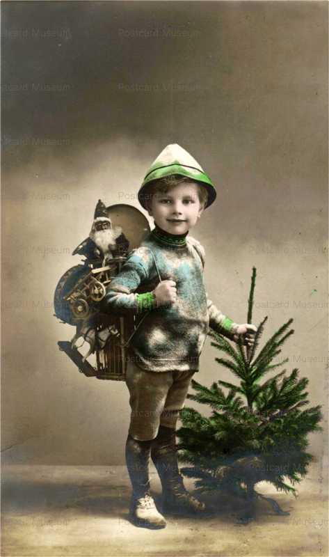 eg405-Boy Carrying a Santa and Horse Doll